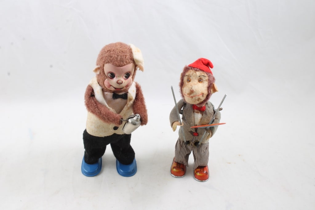 2 Wind-Up Monkey Toys Made in Japan Working: 2 Wind-Up Monkey Toys Made in Japan Working - One Marked Made in Japan, One not marked. Both in working condition as pictured. Please ask questions and read terms & conditions before bidding.