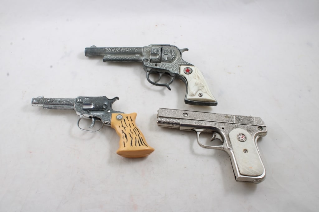 3 Vintage Toy Cap Guns Kilgore, Army 45, Texan Jr.: 3 Vintage Toy Cap Guns Kilgore, Army 45, Texan Jr. - All Working as pictured. Please ask questions and read terms & conditions before bidding.