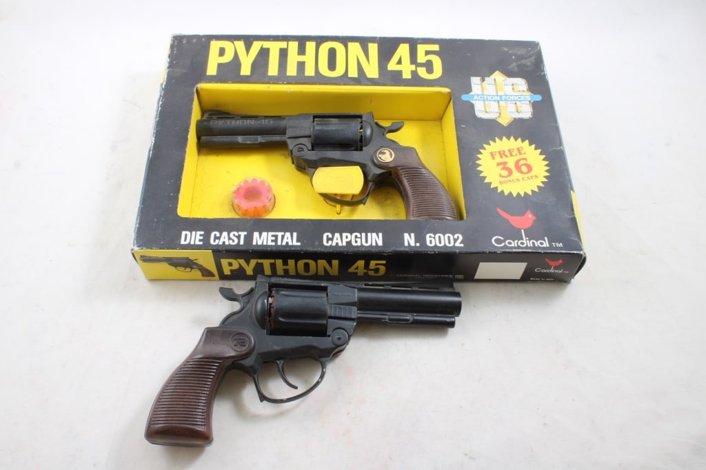 2 Python 45 Diecast Metal Cap Guns #6002 1 in Box: 2 Python 45 Diecast Metal Cap Guns #6002 1 in Box - With 3 Rolls of Caps. Made in Italy. As pictured. Please ask questions and read terms & conditions before bidding.