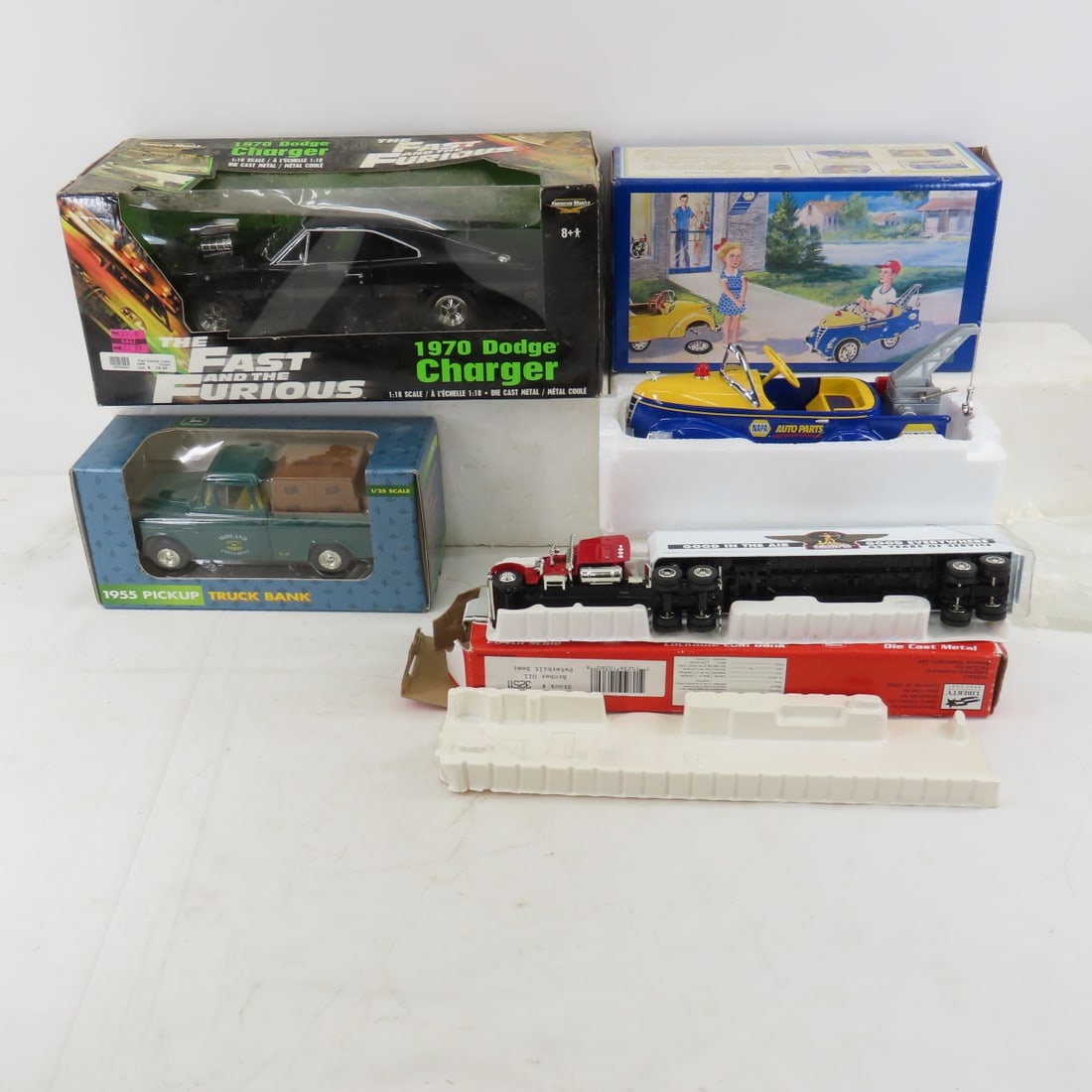 American Muscle 1970 Dodge Charger, tow truck bank: American Muscle 1970 Dodge Charger, tow truck bank -John Deere truck bank & Peterbilt semi bank all in original packages Please ask questions and read terms & conditions before bidding.