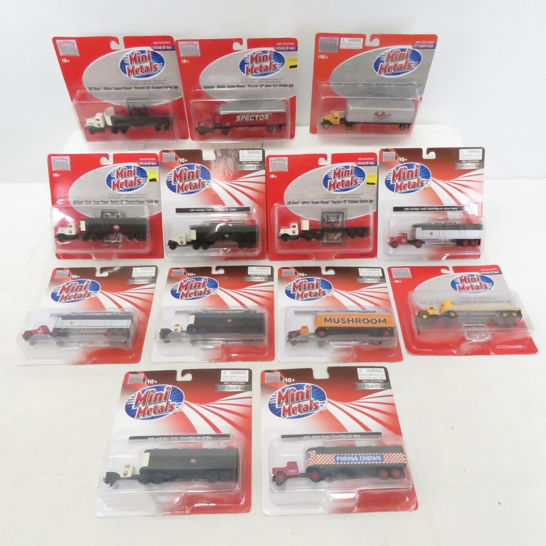 13 Mini Metals 1:87 Diecast Semi Truck Trailers: 13 Mini Metals 1:87 Diecast Semi Truck Trailers - Classic Metal Works NIP Please ask questions and read terms & condition before bidding.