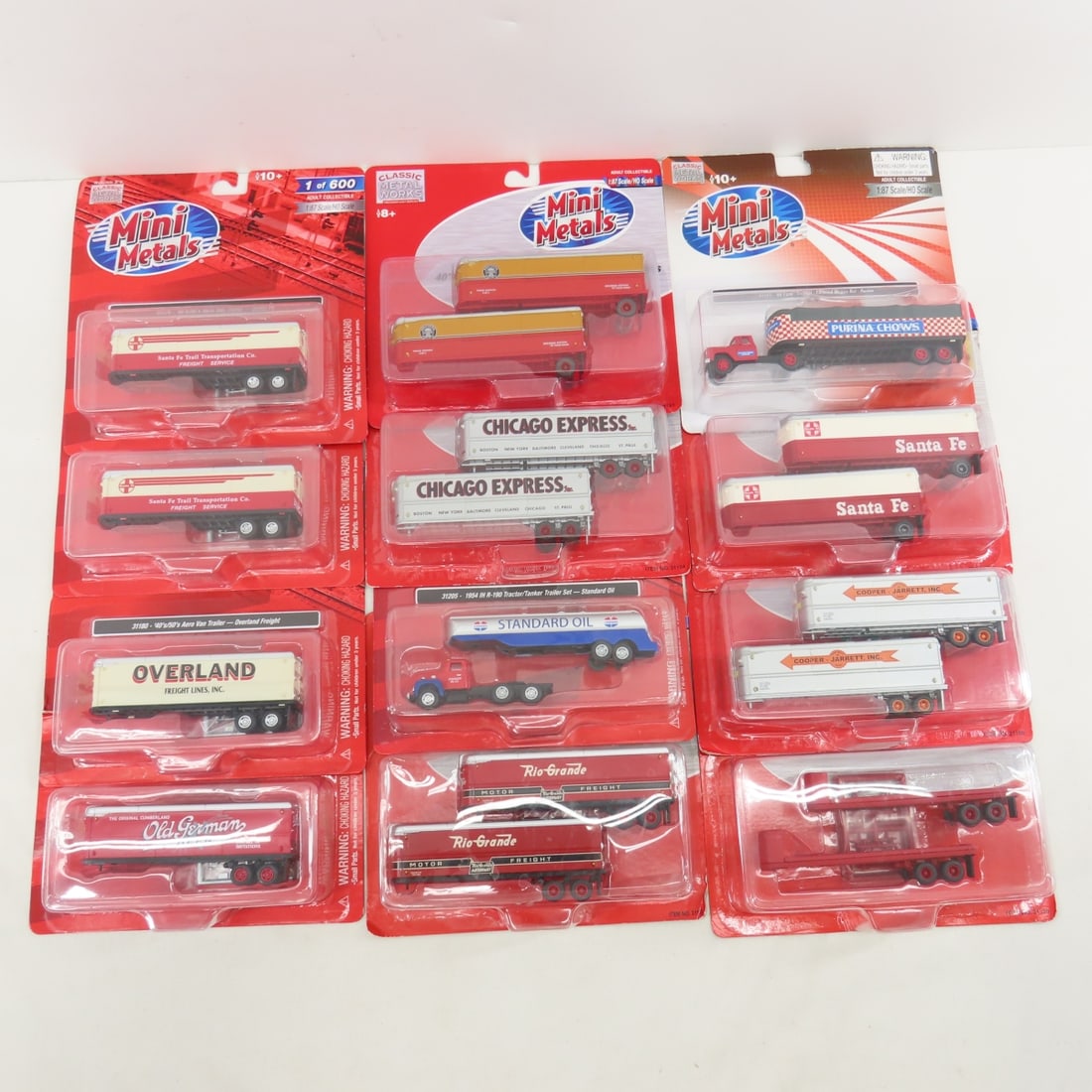 12 Mini Metals HO Semis & Trailers NIP: 12 Mini Metals HO Semis & Trailers NIP - 2 Semi Tractor Trailer, 6 trailer 2 pks & 4 single Classic Metal Works Please ask questions and read terms & condition before bidding.