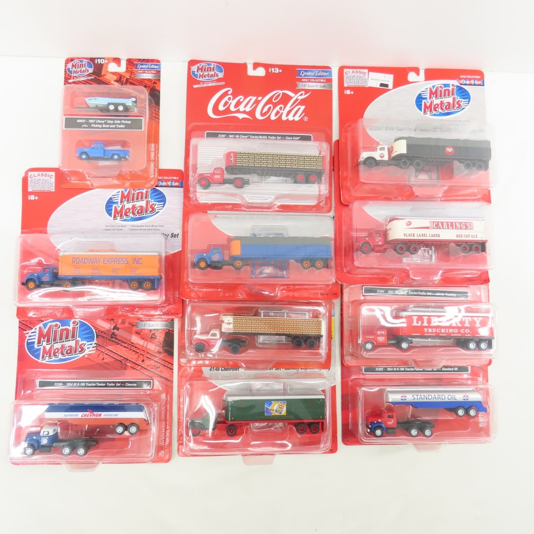 10 Mini Metals 1:87 Semi Truck Trailers NIP: 10 Mini Metals 1:87 Semi Truck Trailers NIP - Classic Metal Works , and 1 pick up with boat Please ask questions and read terms & condition before bidding.