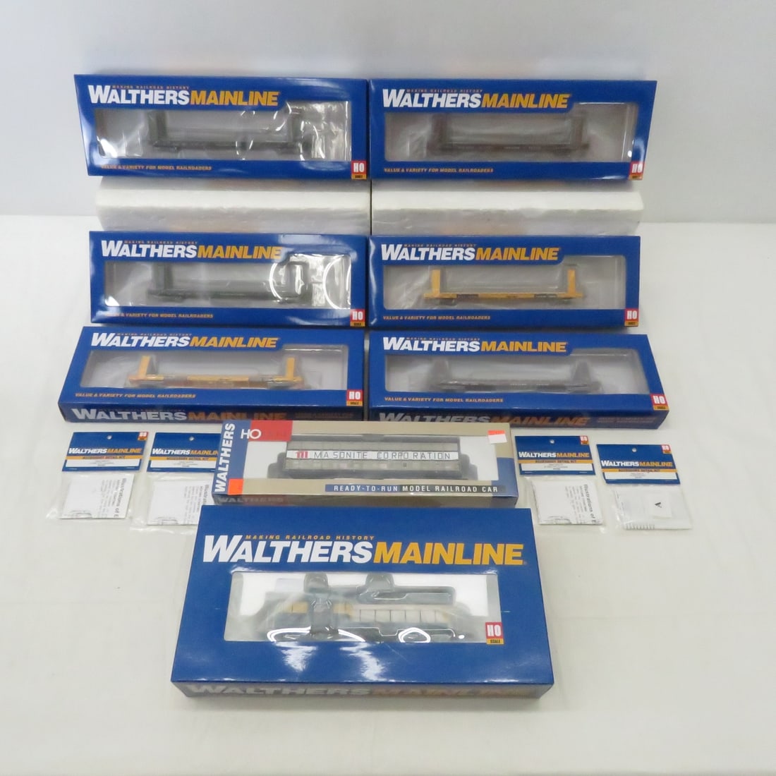 Walthers Mainline HO EMD GP9 Locomotive & Cars NIP: Walthers Mainline HO EMD GP9 Locomotive & Cars NIP - 7 bulk head flat cars, 1 Walthers ready to run box car, 4 accessory detail kits for EMD diesels Please ask questions and read terms & condition bef