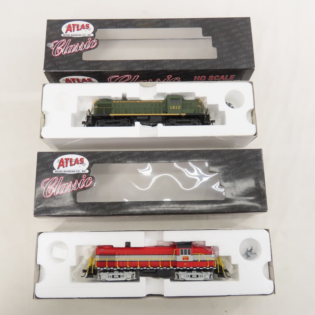 2 Atlas HO Locomotives NIB #7008 & #8452: 2 Atlas HO Locomotives NIB #7008 & #8452 - #7008 - ALCO RS-3 Green Bay & Western #307 & #8452 ALCO RS-3 Canadian National #1812 Please ask questions and read terms & condition before bidding.