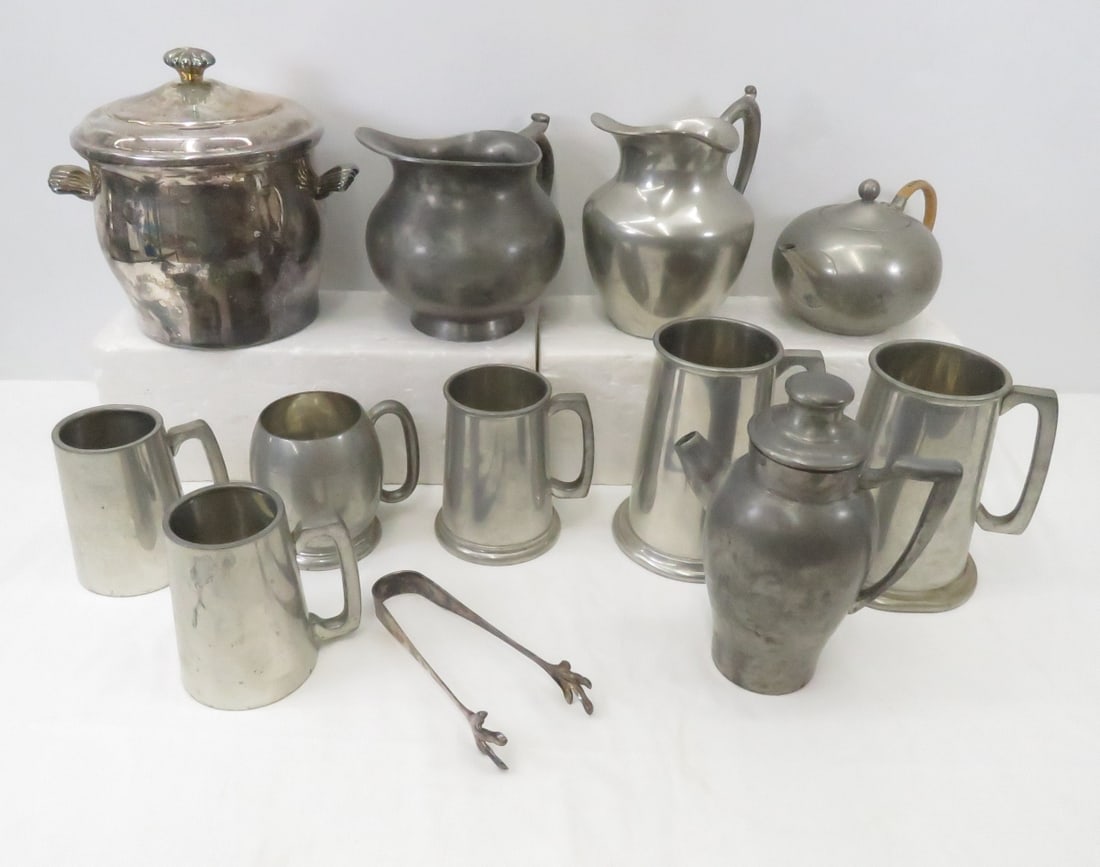 Pewter mugs and pitchers, some silverplate too: Pewter mugs and pitchers, some silverplate too - Please ask questions and read terms & conditions before bidding.
