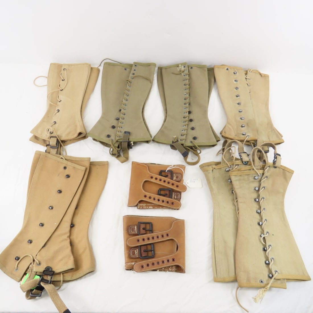 6 Pair WW2 Leggings and Braces: 6 Pair WW2 Leggings and Braces - Leather Braces Stamped 1945 Please read terms & conitions and ask questions before bidding.