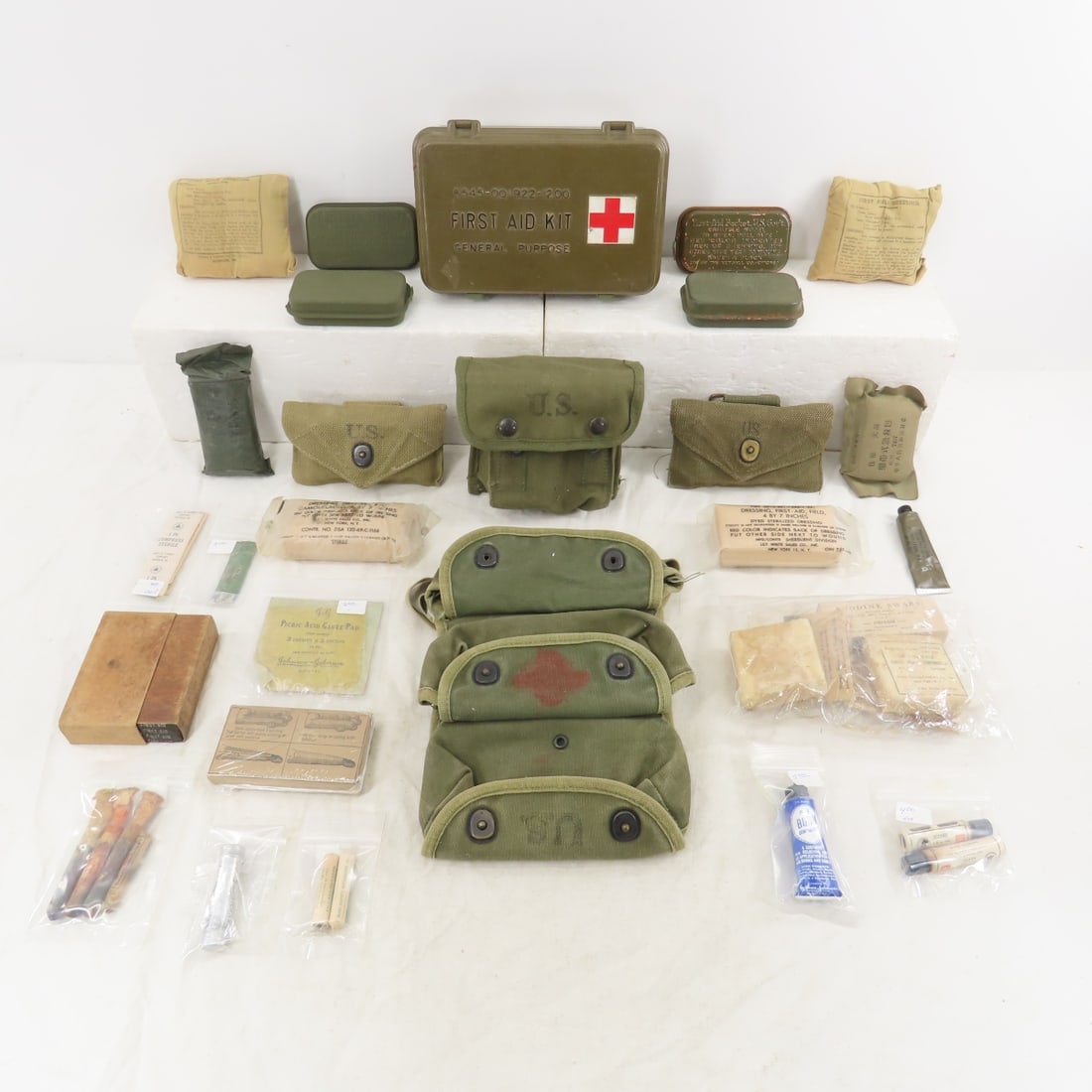 WWII Medical Field Kits, Bandages, Ointments: WWII Medical Field Kits, Bandages, Ointments - First Aid Kit Box, Field Dressing, Carlisle Bags, Splint and More Please read terms & conitions and ask questions before bidding.