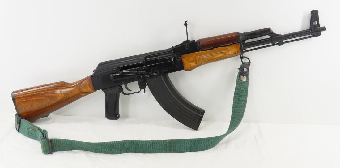 Maadi Egyptian AK47 7.62x39mm Rifle: Maadi Egyptian AK47 7.62x39mm Rifle-16" barrel, fixed front & adjustable rear sight, wood stock & forearm, synthetic pistol grip, with canvas sling & 1 30 round magazine, SN# CA01592, import by CAI St