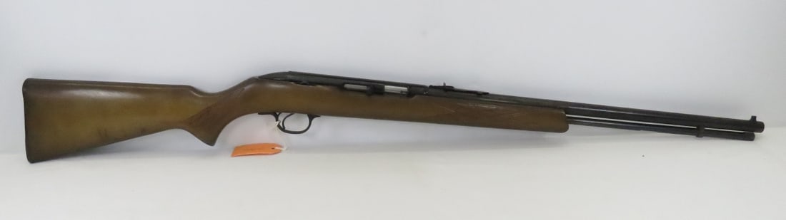 Stevens Model 887 .22 LR Rifle: Stevens Model 887 .22 LR Rifle-20" barrel, tube feed, front & rear sights, checkered wood pistol grip stock SN# C646844, with sock. C&R or FFL transferred required, please know local laws before biddi