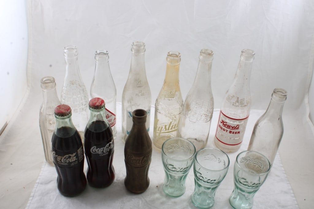 Vintage Soda Bottles, Coke, Viking, Nesbitt, More: Vintage Soda Bottles, Coke, Viking, Nesbitt, More - Crystal, Howell's Root Beer, Pepsi Cola, Old Coke Bottle from Winona, Minnesota, Brass Coke Bottle, and a coke glass, all as pictured. Please ask qu