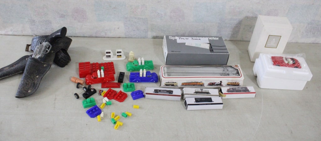 Train Cars, Track, Avon Sports Car, Cap Gun & More: Train Cars, Track, Avon Sports Car, Cap Gun & More - Avon 1950's Collectible Sports Car Convertible new in box, Several Train Cars in original boxes, Pony Boy Cap Gun and Holster Belt, Plastic Toys al