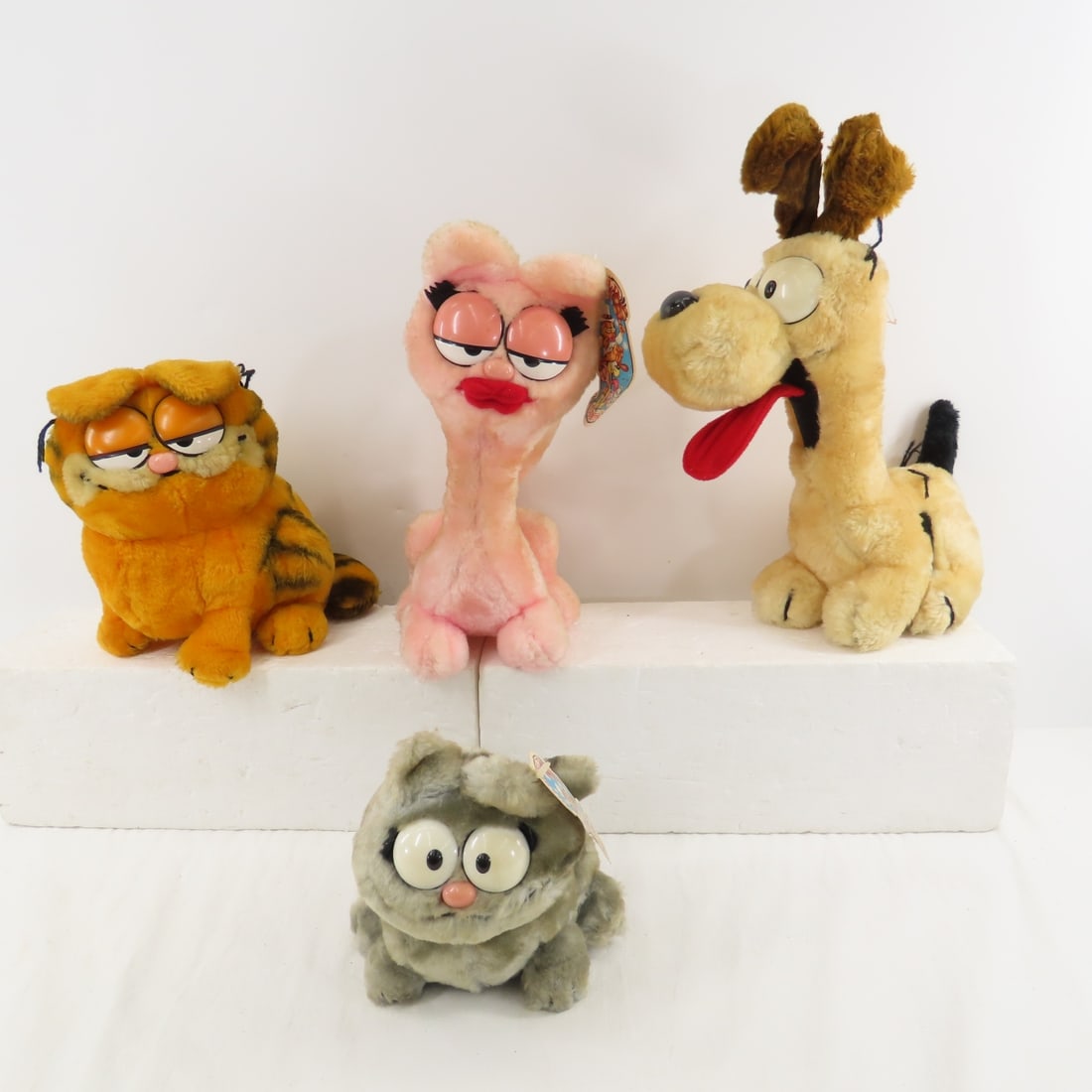 1980's Garfield, Nermal, Arlene & Odie Plush: 1980's Garfield, Nermal, Arlene & Odie Plush - all in used condition-most displayed- some with hang tags Please read terms & conditions and ask questions before bidding.