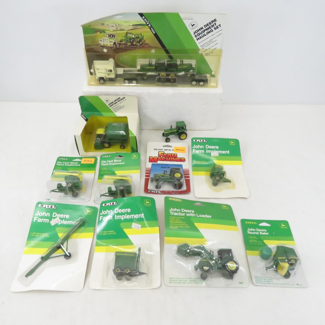 10 Ertl John Deere Die Cast Tractors NIP: 10 Ertl John Deere Die Cast Tractors NIP - John Deere Tractors, Loader, Baler, Hopper, Cotton Picker and More NIP, John Deere Equipment Hauling Set, All 1/64 Scale Die Cast Metal Please read terms & c