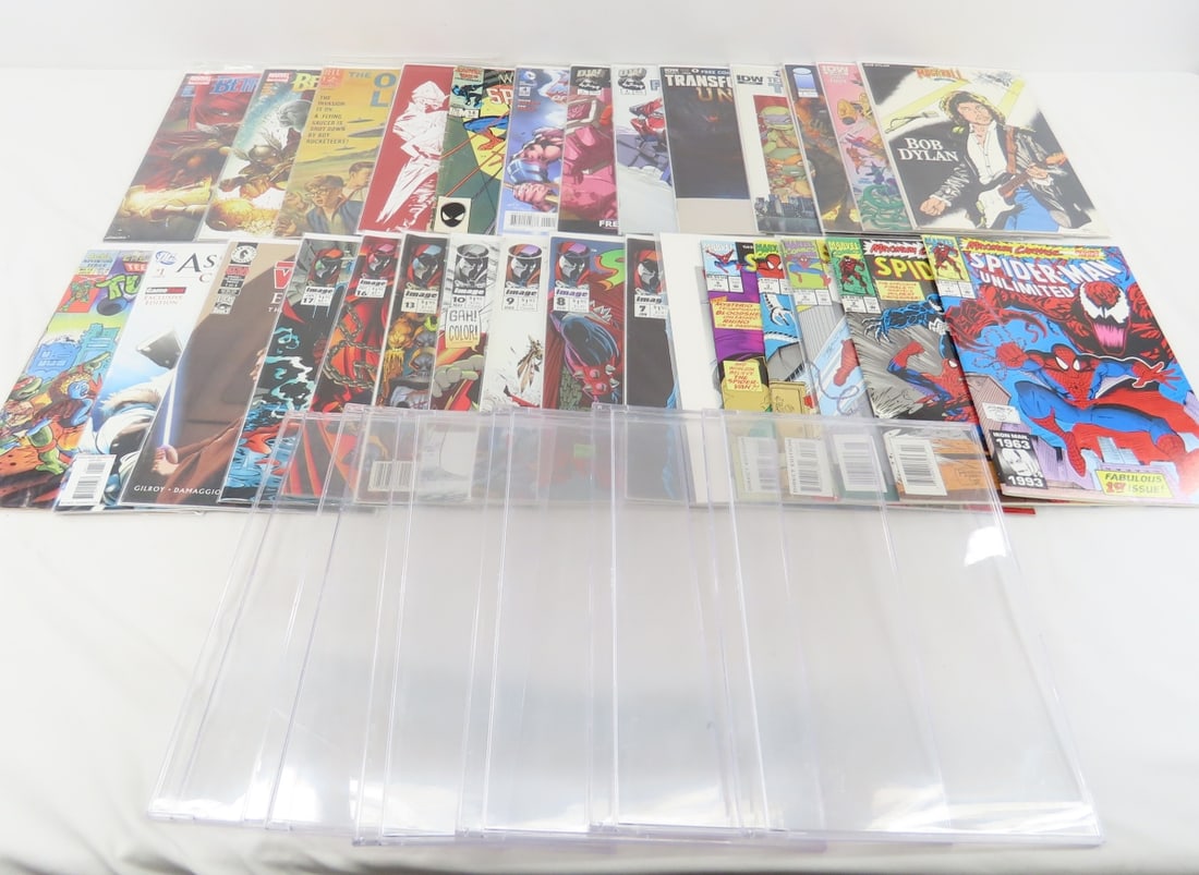 Marvel, Spawn, Transformers & Other Comics: Marvel, Spawn, Transformers & Other Comics - 6 plastic comic cases Please read terms & conditions and ask questions before bidding.