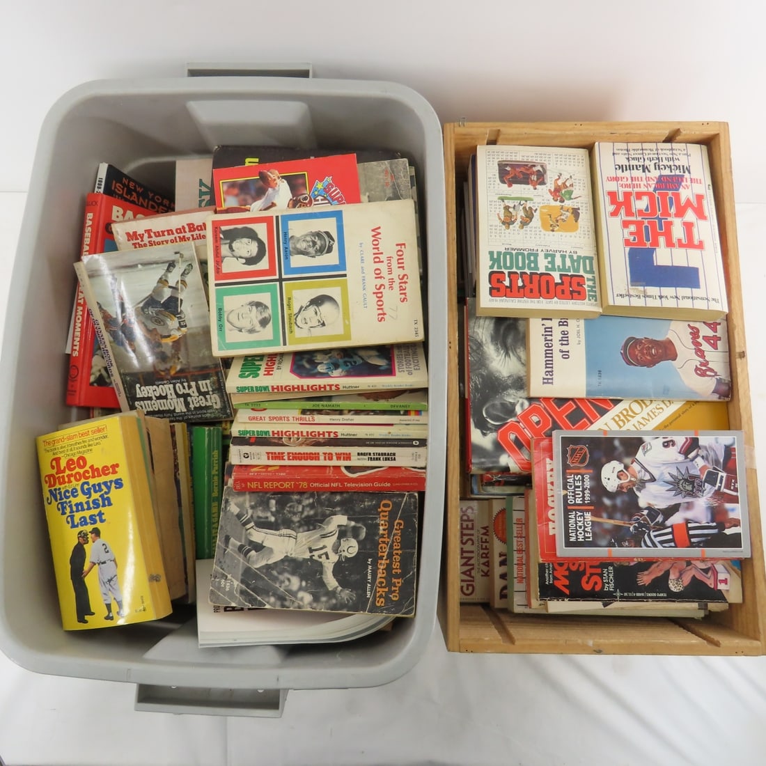 2 Bins of Sports Related Paperback Books: 2 Bins of Sports Related Paperback Books - Keep in mind shipping costs when bidding if applicable. Please read terms & conditions and ask questions before bidding.