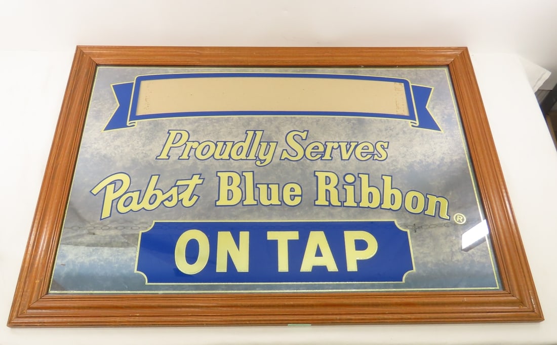 "Proudly Serves Pabst Blue Ribbon On Tap" Mirror: "Proudly Serves Pabst Blue Ribbon On Tap" Mirror - "(blank)" Proudly Serves Pabst Blue Ribbon on Tap" 28.5 x 40" Please ask questions & read terms and conditions before bidding.