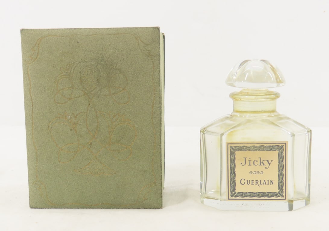 Vintage Guerlain Jicky Perfume Bottle in Box: Vintage Guerlain Jicky Perfume Bottle in Box - Bottle is empty, No visual Chips or Cracks Please ask questions & read terms and conditions before bidding.
