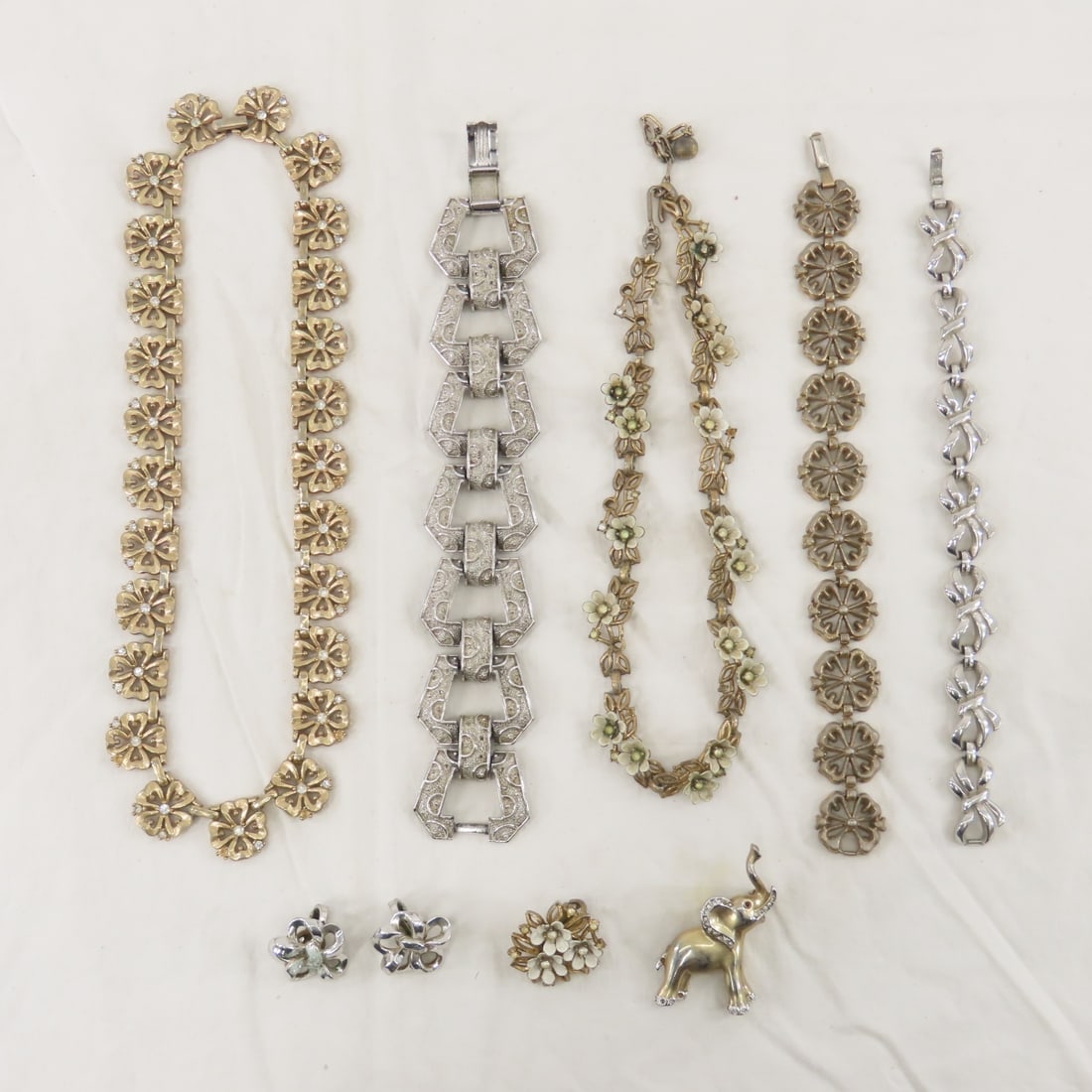 Vintage Trifari Jewelry- some Alfred Phillipe: Vintage Trifari Jewelry- some Alfred Phillipe - cluster flower necklace only has 1 matching earring Please ask questions & read terms and conditions before bidding.