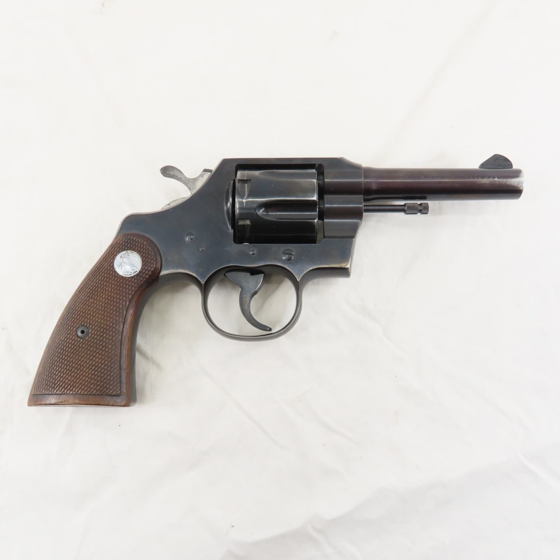 Colt Official Police .38 Special CTG Revolver: Colt Official Police .38 Special CTG Revolver-6 shot, 4" barrel, front blade sight, exposed hammer, checkered wood grips, Serial # 848093, C&R or FFL transfer required, please know local laws before b