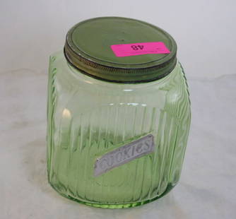 1930s Vaseline Uranium Glass Cookie Jar: 1930s Vaseline Uranium Glass Cookie Jar - Hoosier Jar GLOWS under black light and measures 8 1/2" Tall as pictured. Please ask questions and rerad terms & conditions before bidding. 