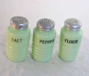 3 Jadeite Jeanette Shakers Salt, Pepper Flour: 3 Jadeite Jeanette Shakers Salt, Pepper Flour - All measure 5" Tall and are ribbed and GLOW UNDER BLACK LIGHT. All of the lids are loose fitting. As pictured. Please ask questions and rerad