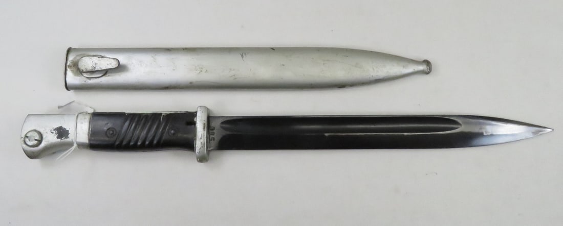 M98 WWII German Mauser Bayonet & Scabbard: M98 WWII German Mauser Bayonet & Scabbard - Overall Length: 15.25", Blade: 10", Ricasso & Scabbard Stamped: 41 cLc, Serial: 980, Handle Stamp: aA883 Please ask questions & read terms conditions before