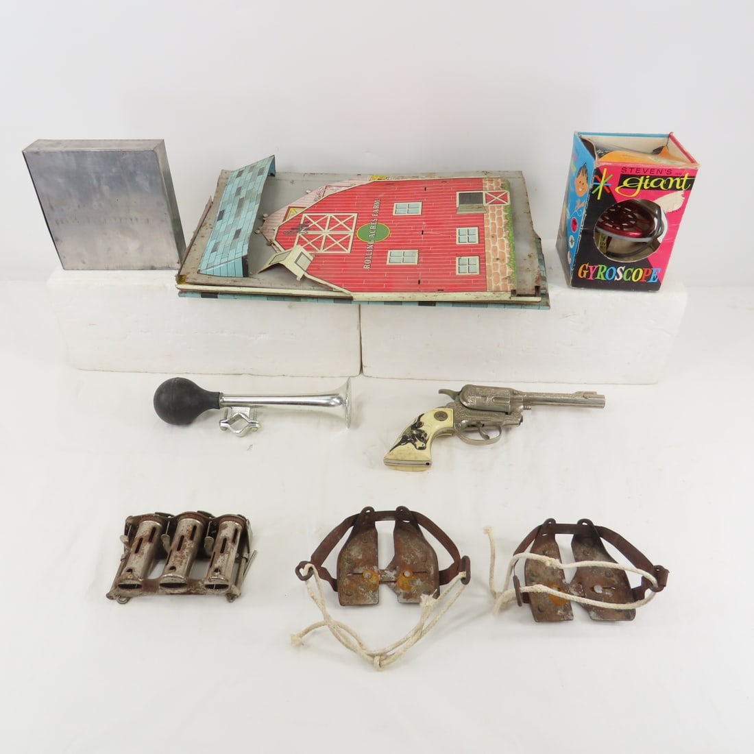 Vintage Bike Horn, Cap Gun, Coin Changer & More: Vintage Bike Horn, Cap Gun, Coin Changer & More-Texan Jr. Cap Gun, Steven's Giant Gyroscope, Coin Changer, Vintage Metal Ice Cleats for Shoes, Metal Box, Bike Hore, Tin Litho Barn Parts (may be incomp
