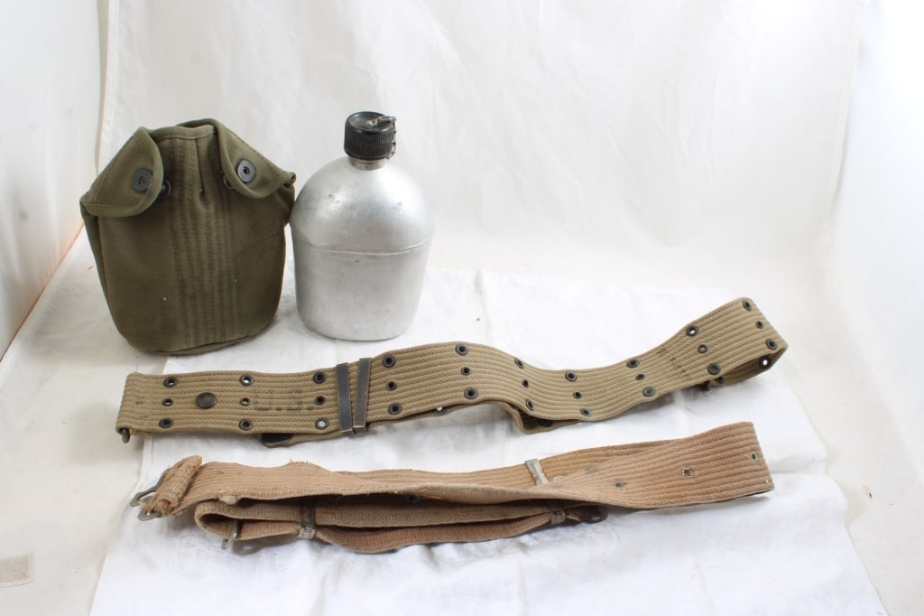 WW2 Military Canteen 1945 & Belts: WW2 Military Canteen 1945 & Belts - As pictured. Please ask questions and read terms & conditions before bidding.