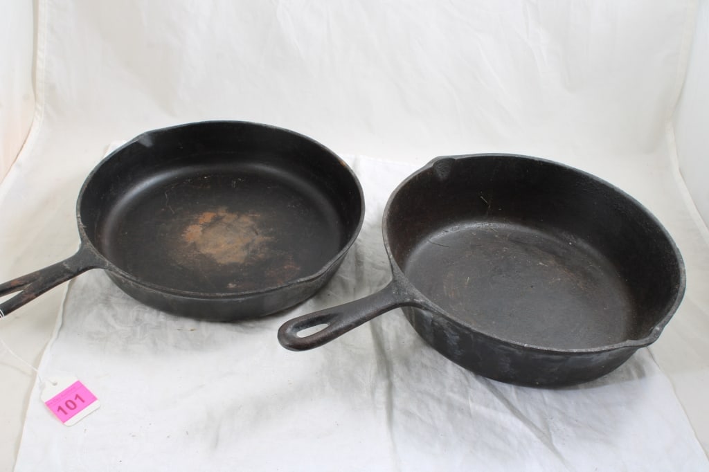 2 No. 8 USA Cast Iron Skillets: 2 No. 8 USA Cast Iron Skillets - As pictured. Please ask questions and read terms & conditions before bidding.