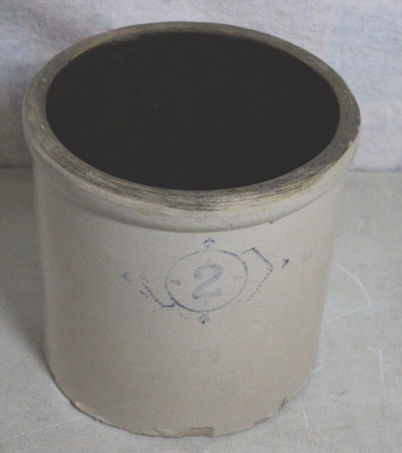 2 Gallon Monmouth Stoneware Crock: 2 Gallon Monmouth Stoneware Crock - Has some chips around bottom as pictured. Please ask questions and read terms & conditions before bidding.