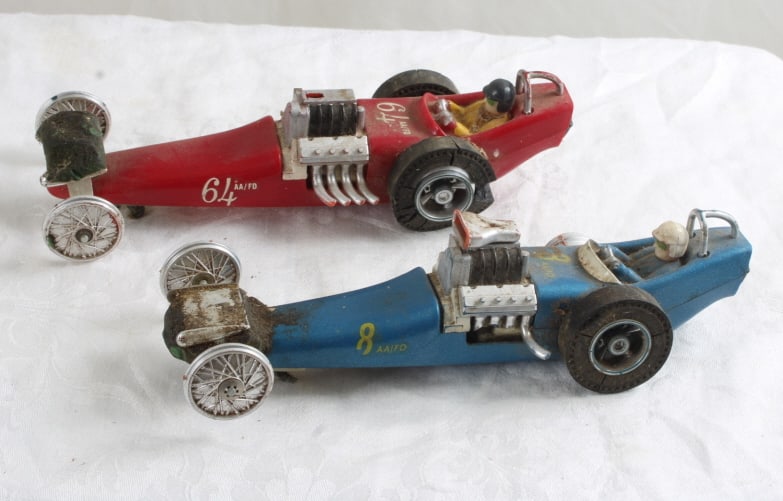 2 Eliminator 1960s Dragster Slot Cars 7": 2 Eliminator 1960s Dragster Slot Cars 7" - Blue & Red Dragster Slot Cars 7". Untested, Repair (missing some tires) and need cleaning as pictured. Please ask questions and read terms & conditions befor