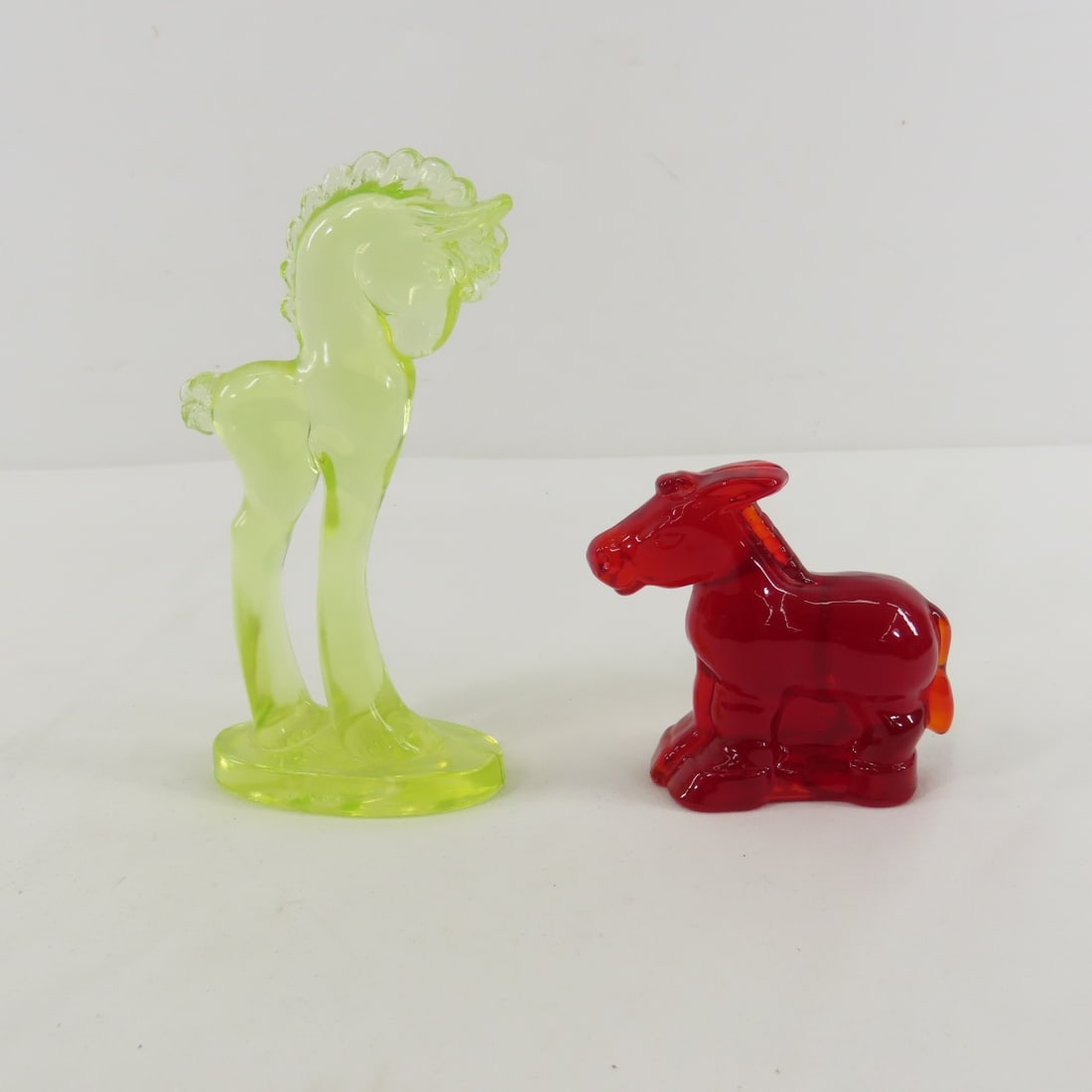 Mosser Glass Red Mule & Uranium Glass Horse: Mosser Glass Red Mule & Uranium Glass Horse - uranium is 5.75"- has a couple of flea bites on bottom edge, bottom marked Please ask questions and read terms & conditions before bidding.