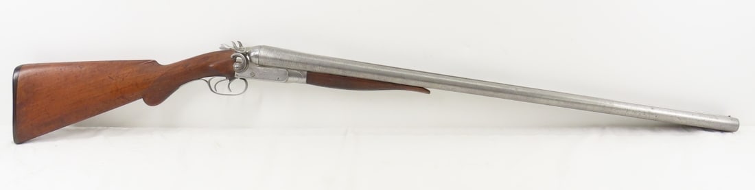 Ithaca Gun Co A Grade NIG SxS 10 GA Shotgun: Ithaca Gun Co A Grade NIG SxS 10 GA Shotgun - 30" barrels with ejectors, exposed hammers, double triggers, last patent is Sep 13, 1887, repair on checkered wood forearm, checkered pistol grip