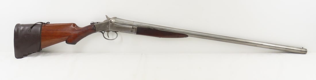 Simmons Hardware Co Cannon Breech 12 GA Shotgun: Simmons Hardware Co Cannon Breech 12 GA Shotgun - manufactured by Hopkins & Allen, 30" barrel, front bead sight, exposed hammer, wood forearm and stock with "Simmons Hardware Co" on medallion on
