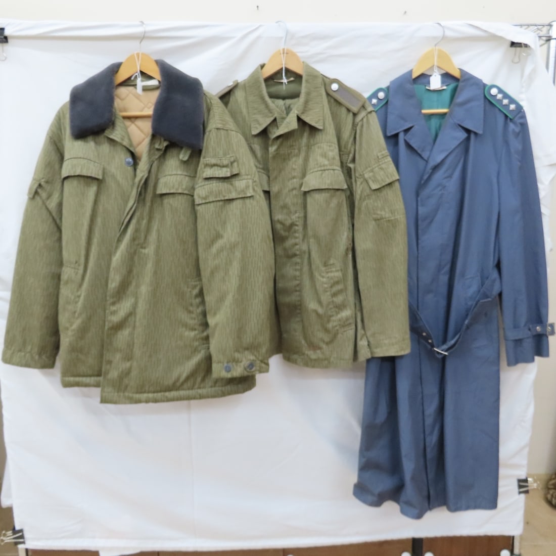 E German Military Rain Coat, Winter Coat & Tunic: E German Military Rain Coat, Winter Coat & Tunic - with hood Please ask questions and read terms & conditions before bidding.