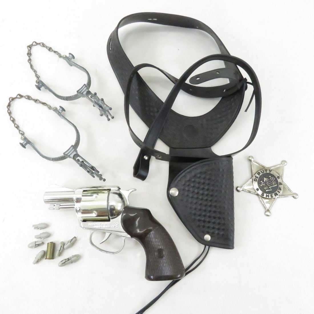 Mattel Toy Cowboy Revolver & Sheriff Set: Mattel Toy Cowboy Revolver & Sheriff Set - spurs, badge, holster Please ask questions and read terms & conditions before bidding.