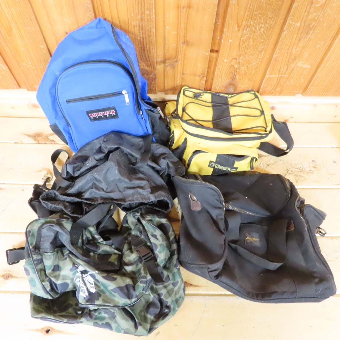 5 Duffle Bags, Backpack, Eddie Bauer & More: 5 Duffle Bags, Backpack, Eddie Bauer & More - Gander Mountain, Eddie Bauer, Northern Sport and More Please ask questions and read terms & conditions before bidding.