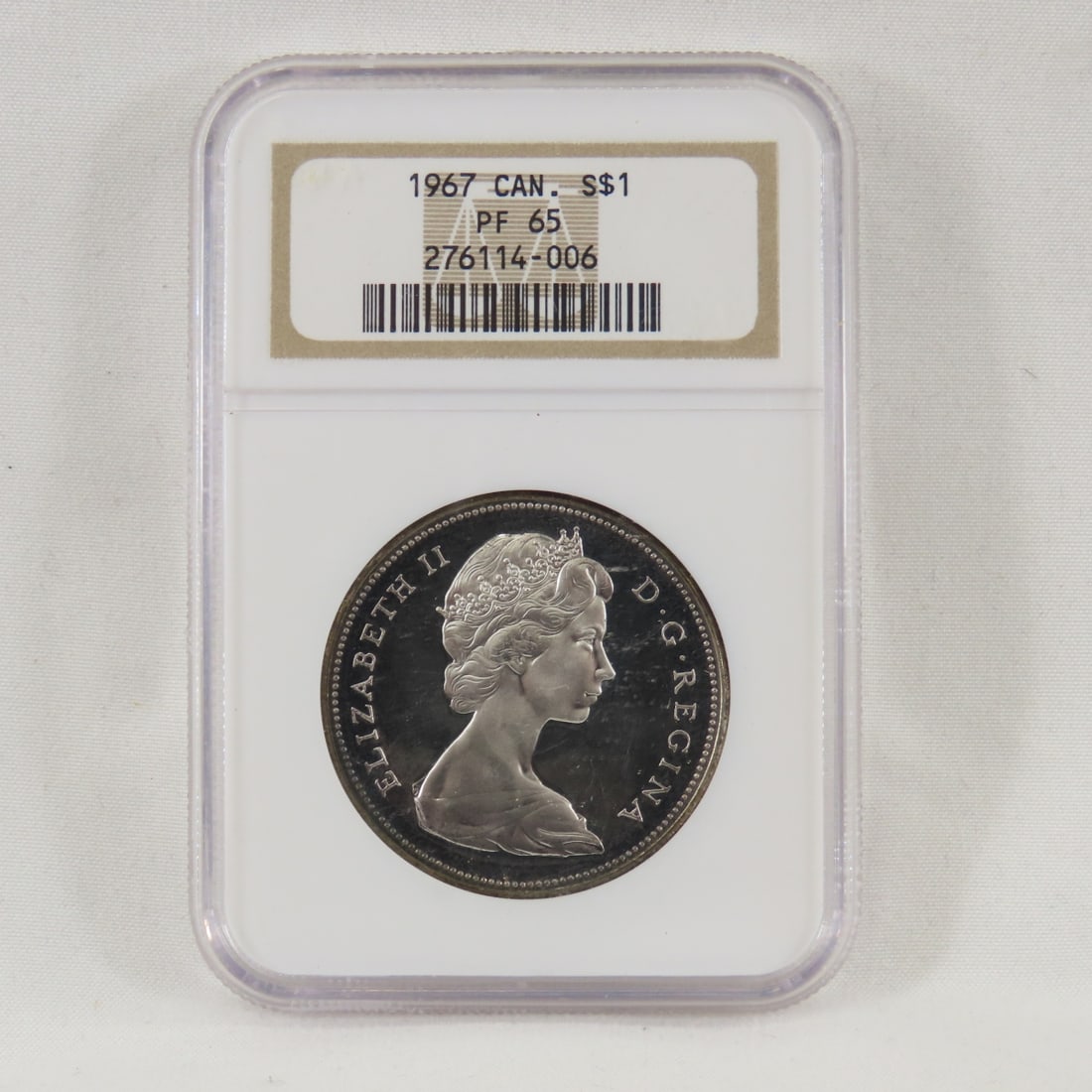 1967 Canadian Silver $1 NGC PF65: 1967 Canadian Silver $1 NGC PF65 - Please ask questions & read terms and conditions before bidding.