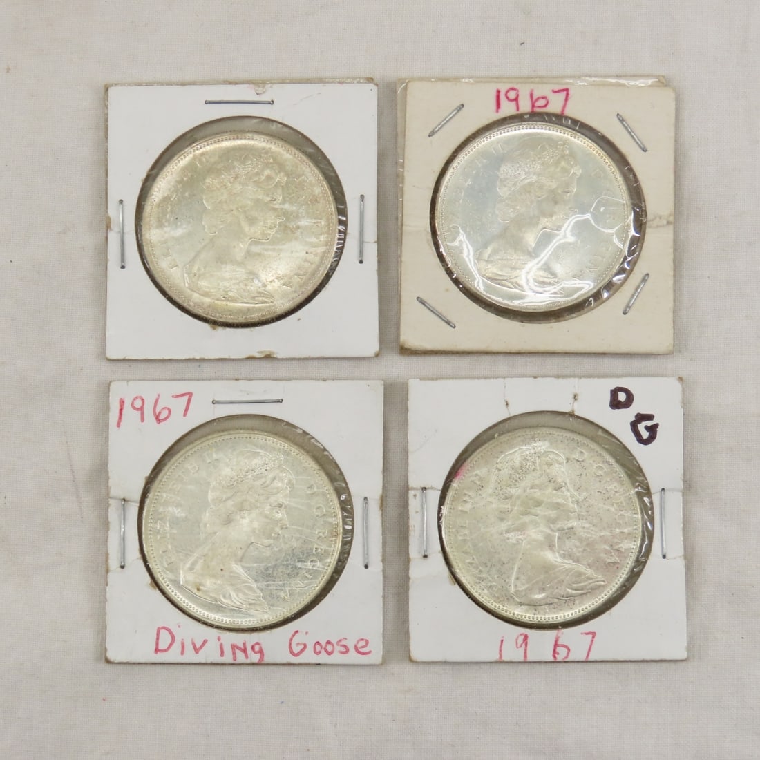 4 1967 Canadian Silver Dollars (1 of 9)