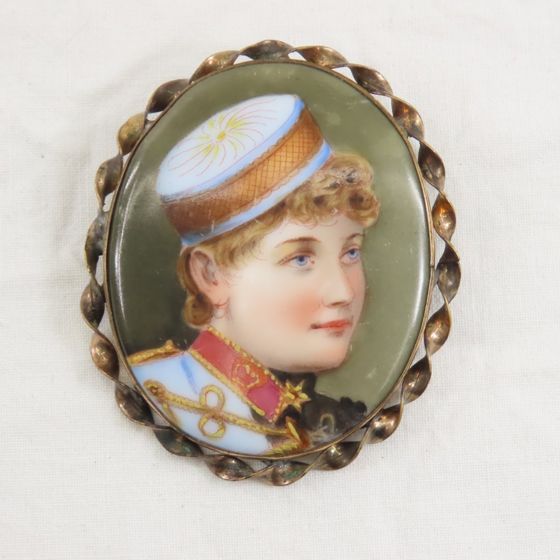 Antique Hand painted Lillian Russell Brooch: Antique Hand painted Lillian Russell Brooch - 2 3/8" tall. Lillian Russell was an American actress and singer 1861-1922. Identification provided by seller. Please ask questions and read terms & condit