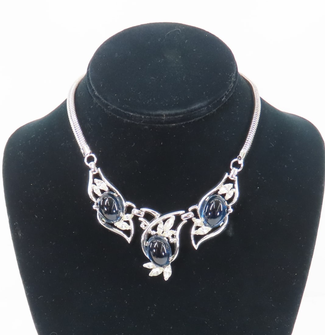 Crown Trifari Rhodium Plated Blue Stone Necklace: Crown Trifari Rhodium Plated Blue Stone Necklace - 3 large blue cabochons and several marquis rhinestones, snake style chain, marked "Trifari pat Pend" Please ask questions and read terms & conditions