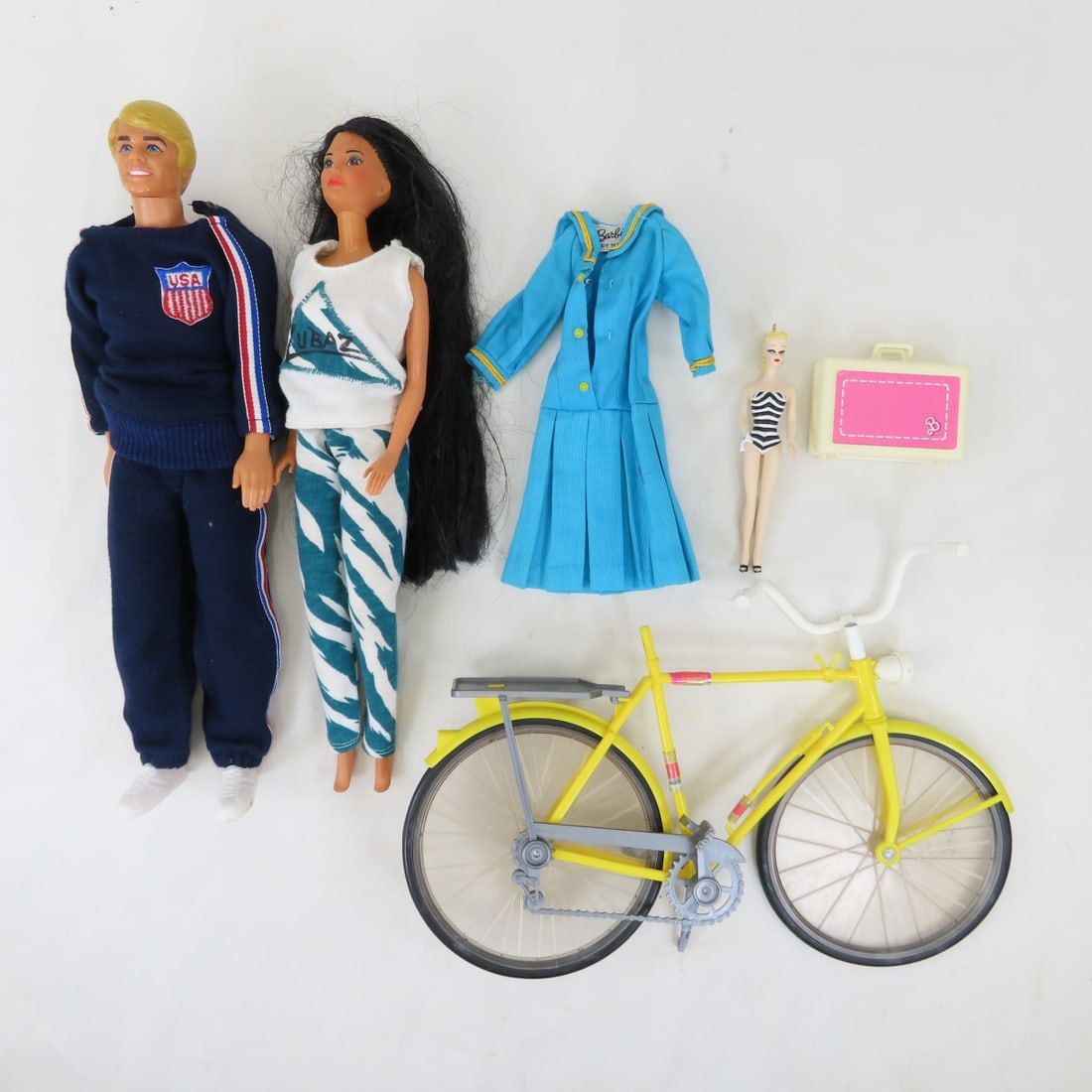 1968 Vintage Ken Doll, Barbie & More: 1968 Vintage Ken Doll, Barbie & More - Ken with USA Suit, Pocahantas, Vintage Barbie 'Sea Worthy Dress, Barbie Suitcase with Blow Dryer, 1970's Barbie 10-Speed Bike Please ask questions and read terms