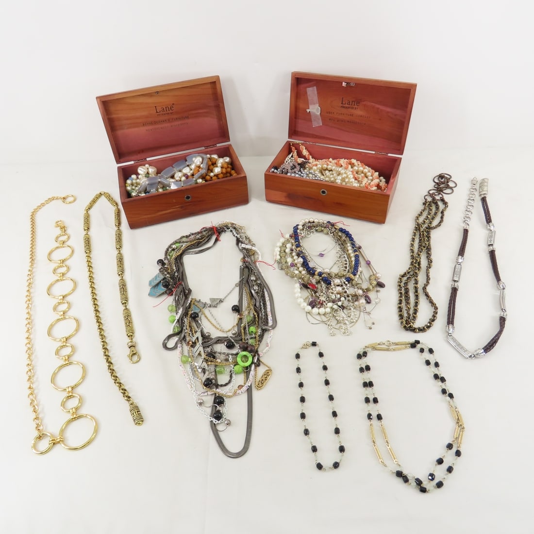 2 Lane Jewelry boxes, Fashion Jewelry & Belts: 1 box is Red Wing, MN and 1 is Monticello, MN. PLease ask questions and read terms & conditions before bidding.