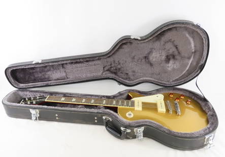 Epiphone '56 Gold Top Les Paul Reissue Electric Guitar: Epiphone '56 Gold Top Les Paul Reissue Electric Guitar - with hard case, serial number 10041510534 Please ask questions and read terms & conditions before bidding.