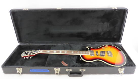 Epiphone Nighthawk Custom Reissue Electric Guitar: Epiphone Nighthawk Custom Reissue Electric Guitar - with hard case, serial number 12032307896 Please ask questions and read terms & conditions before bidding.
