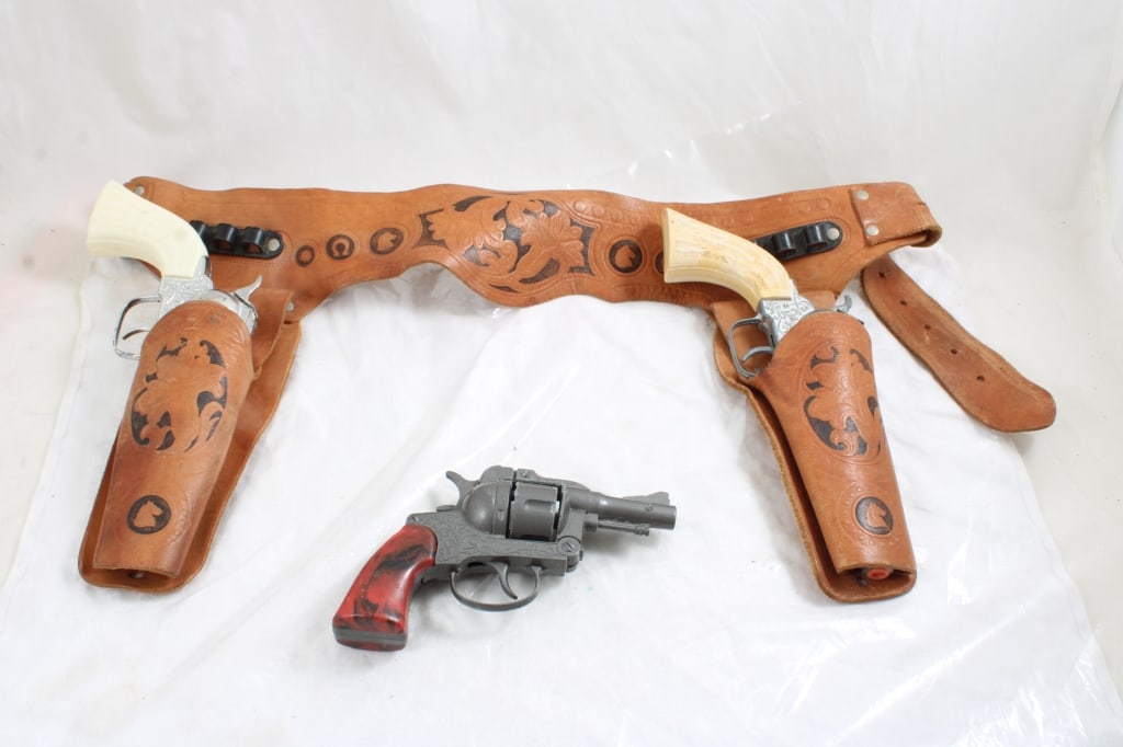 Belt Holster w/2 Cap Guns, Crescent Toys Pistol: Belt Holster w/2 Cap Guns, Crescent Toys Pistol - All as pictured. Please ask questions & read terms and conditions before bidding.