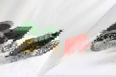 2 Cast Iron Tractors: 2 Cast Iron Tractors - John Deere Measures 6" Long and other Tractor unmarked measures 6" long too. Both as pictured. Please ask questions & read terms and conditions before bidding.