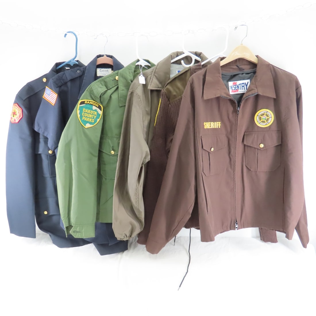 Police, Fire, Sheriff, & Ranger Coats & Sweaters: Police, Fire, Sheriff, & Ranger Coats & Sweaters - sizes range small-large Please read terms & conditions and ask questions before bidding.
