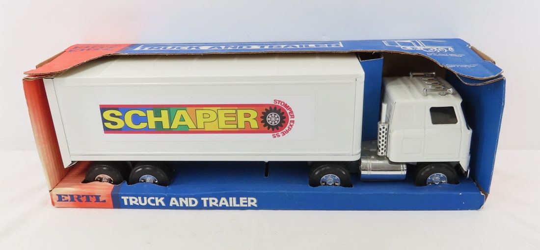 ERTL Truck & Trailer with box: ERTL Truck & Trailer with box - Schaper sticker added by consignor for display Please ask questions & read terms & conditions before bidding. Live Auctioneers only display 20 photos per lot, whereas P